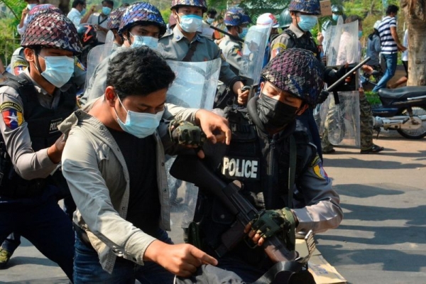 Myanmar army suspends laws limiting forces, hunts protest backers