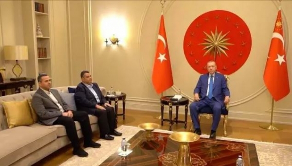 أردوغان يستقبل نجلي إسماعيل هنية